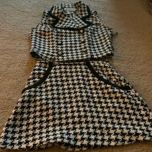 Woman’s two piece black and white suit